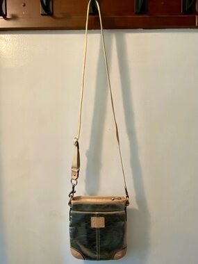 Silver Leather Coach Crossbody Bag with Adjustable Tan Strap
